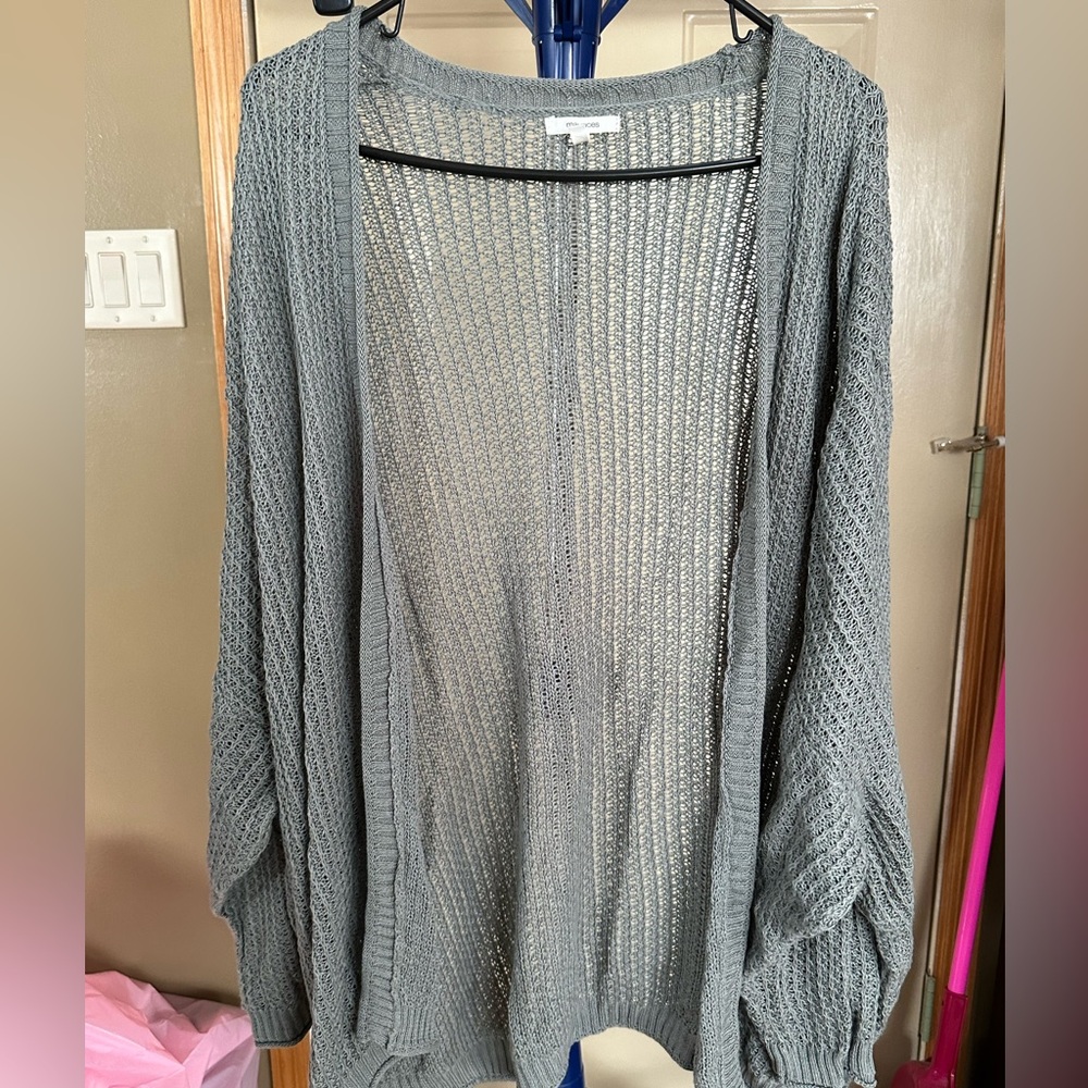 Lightweight green cardigan.